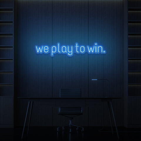 "WE PLAY TO WIN." NEON SKILT