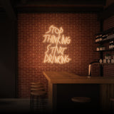 "STOP THINKING START DRINKING" NEON SKILT