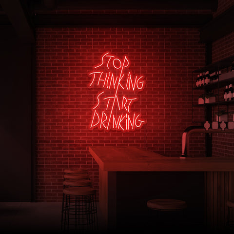 "STOP THINKING START DRINKING" NEON SKILT